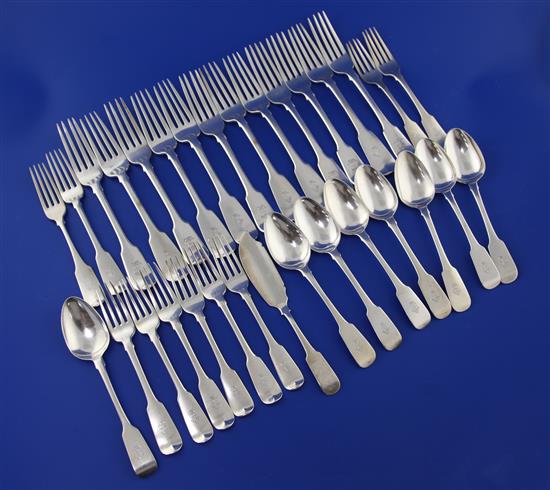 A part suite of George IV Irish and English silver fiddle pattern flatware,